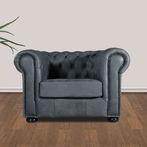 Stylish Chesterfield sofa in living room.