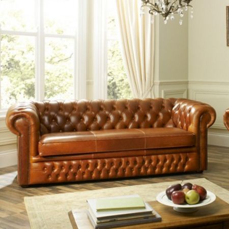 Chesterfield sofa with tufting.